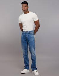 Medium Blue 5 Pocket Mid Rise Loose Boot Leg Stretch Jeans